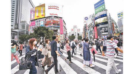 日本疫情反覆，死亡人數過千。（美聯社圖片）