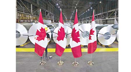 美國恢復對加拿大鋁材徵收關稅。（美聯社圖片）