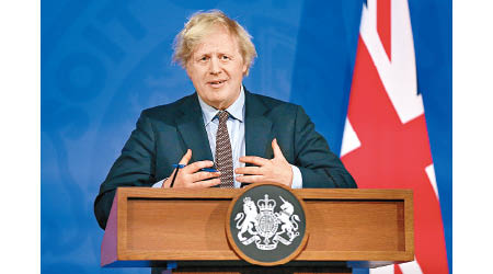 英國首相約翰遜正從速制定開放國際旅遊計劃。