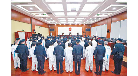 兩宗電騙案中46人在北京受審。