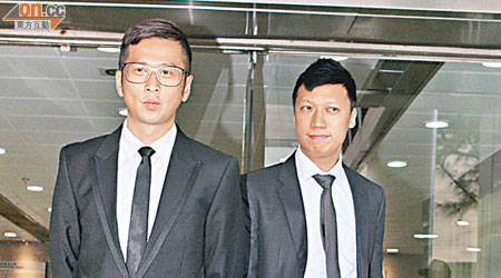 梁永傑（左）及「阿肥」獲准保釋，下月九日轉介區域法院審理。