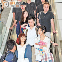 HKT抵港時有多名保安在機場護駕。