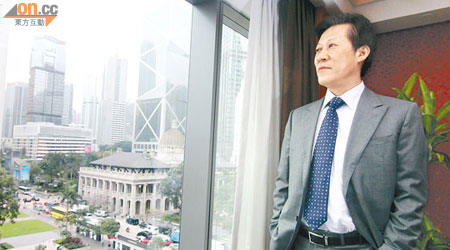 重慶機電董事長謝華駿表示，內地電網建設為公司變壓器帶來商機。（胡耀威攝）