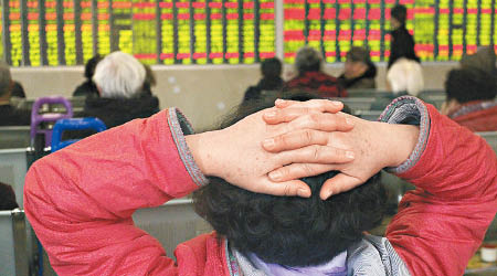 受兩項不利因素夾擊，滬深股市昨日受壓。（中新社圖片）