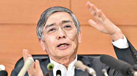 日央行黑田東彥相信，日本經濟明年將會向好。（資料圖片）
