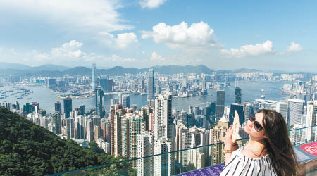 各大行今年陸續上調對香港樓市預測。