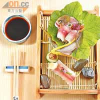 冷煙熏香魚 約$98/條<BR>香魚帶有淡淡西瓜香味，故又名西瓜魚。多做成串燒，師傅則以冷煙熏香，使魚身帶有濃厚的燒櫻木香氣，肉質嫩滑。配上白酒煮芥末子醬，微酸帶辣，更惹味。