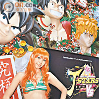 NAMCO Bandai Games攤位設有卡通人物浮雕，中間嵌有電視狂播《J-Stars Victory Vs》遊戲片段。