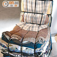 Rag Chair：以15包舊衣物（約150~200件）綑綁而成，每一張椅均獨一無二，買家更可利用自己的衣服打造一張，廢物利用。$48,000
