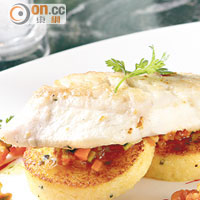 Codfish Mediterranean Style<br>這款主菜以薑味玉米糊、法式燉菜和紅菜頭醬汁作配料，為嫩滑鱈魚添上地中海風味。
