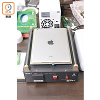 iPad面板用膠水封口，要專業工具如熱熔機才能打開。