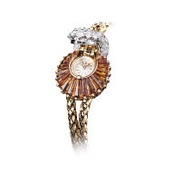 1956年，日內瓦設計師Jean Hauck特別為Montres et Bijoux產品目錄及展覽而打造此錶。除以21顆三角長方形切割的橙色黃晶拼出扇形圖案外，錶蓋及錶環亦鑲有31顆明亮切割閃鑽。