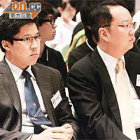 啟剛（左）晚上出席有關申辦亞運嘅交流會，右為香港青聯主席陳仲尼。 （蘇文傑攝）
