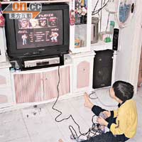兒童長時間坐着打遊戲機，「唔願郁」是致肥原因。