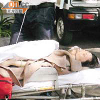 長洲<br>一名女子送院時需戴上氧氣罩協助呼吸。	（黃子源攝）