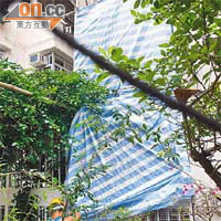 孫明揚寓所被揭發僭建，隨即圍起帆布準備清拆工程。	（資料圖片）