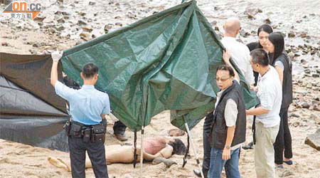僅穿內衣褲的女死者前日被發現伏屍青龍灣沙灘。	（資料圖片）