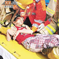 陳天朗<br>幼弟天朗右眼撞傷，由消防員救出。
