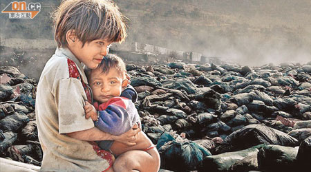 陳國雄憑這張尼泊爾貧童照揚威海外。（陳國雄提供）