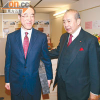 唐英年競選辦公室主任李國寶（右），九月將面對獲中資銀行支持的吳亮星挑戰。（資料圖片）