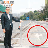 陳諾恒指運輸署加設石壆但未有更改路面標誌（紅圈示），易引起交通混亂。