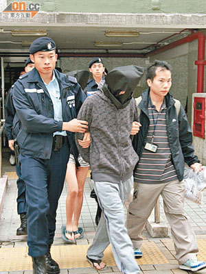 秀茂坪踢死貓案，警方拘捕涉案男子。（資料圖片）