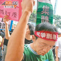 遊行的罷工工人誓言會繼續抗爭。