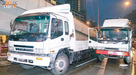 貨車司機被夾於兩車間。（梁國雄攝）