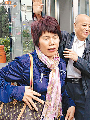 女事主賴碧雲（左）與丈夫陳俊傑昨到庭作供。