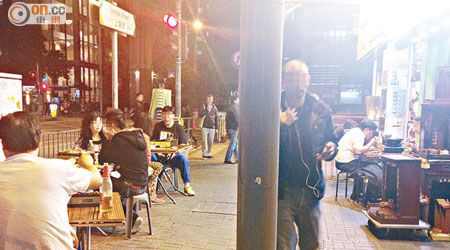 麻辣火鍋店佔用行人路空間經營，被指對附近居民造成滋擾。