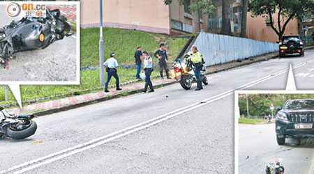 涉事的電單車座位撞散，翻側在路邊。解放軍車前遺下死者的頭盔。（黃永健攝）