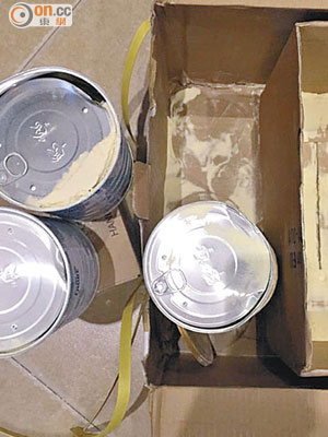 郵包寄抵北京後，收件人拆開卻發現內裏的奶粉金屬罐封口被壓至變形掀開。