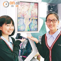 元朗商會中學兩名女學生嘅畫作獲評為優異作品。