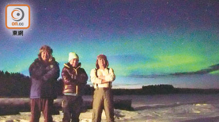 左起：胡名川、陳嘉儀及陳國經今年三月遠征北極，觀賞到罕見的粉紅色極光。（受訪者提供）