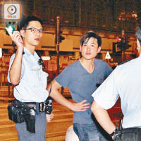 尖東<BR>被偷手機的男子協助警員調查。