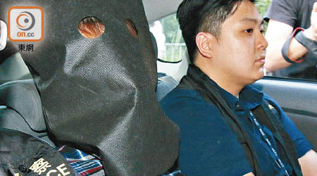 被告李兆恒（左）承認虐貓，收押候判。