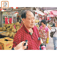 陳先生經營生果舖，新例落實後，他因空間有限要減少入貨量。