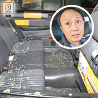 刑毀的士<br>的士車窗被打破，車內遍布玻璃碎。司機（圓圖）講述案發經過。