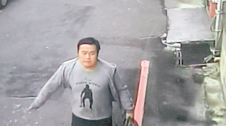 姓成香港男子被閉路電視拍下逃走過程。（中時電子報圖片）