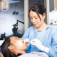 牙齒琺瑯質流失可令牙齒崩缺，需填充人工合成的樹脂物料。（黃知樂攝）