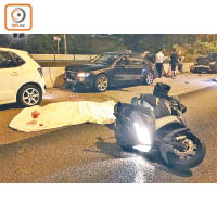 大埔公路<br>駕電單車休班警被撞至人車分離，被後車輾斃。