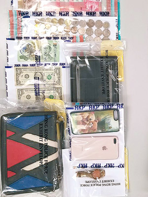 檢獲的證物包括手機及現金。（警方圖片）