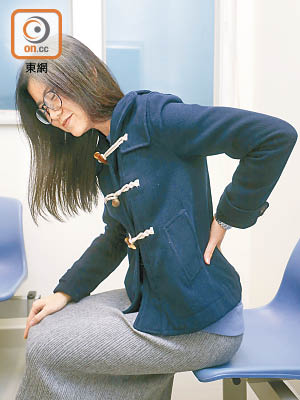 腰痛患者可按壓背部穴位紓緩痛楚。