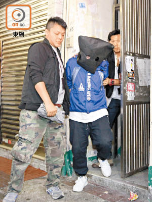 警方相信被捕「槍手」有黑幫背景。（郭垂垂攝）