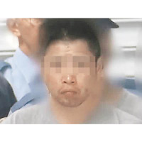 日本警方拘捕其中一名涉案中國籍男子。（電視畫面）