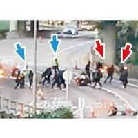 有示威者（紅箭嘴示）手持汽油彈擬擲向警員（藍箭嘴示）。（互聯網圖片）