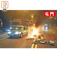 行車路上遭人縱火。（何天成攝）