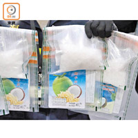 兩名泰籍被告用零食包裝做掩飾，乘國泰航機偷運逾兩公斤K仔來港，被香港海關截獲。