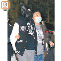 涉案男子被捕。（梁裔楠攝）