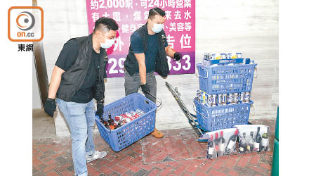 尖沙咀：警方行動中共檢獲336罐啤酒及20支烈酒，總值約8,000元。（胡德威攝）